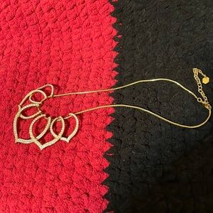 Gold tone white Swarovski crystal necklace. Excellent condition.
